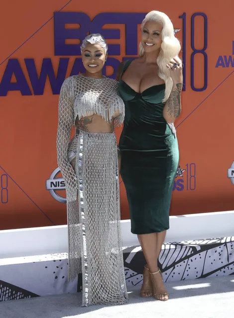 Blac Chyna, left, and Amber Rose arrive at the BET Awards at the Microsoft Theater on Sunday, June 24, 2018, in Los Angeles. (Photo by Willy Sanjuan/Invision/AP Photo)