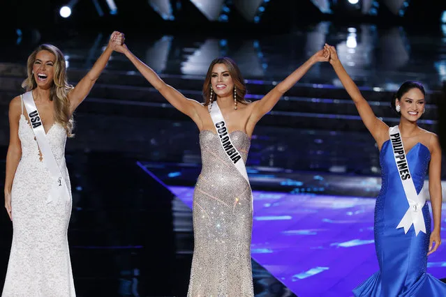 From left, Miss USA Olivia Jordan, Miss Colombia Ariadna Gutierrez and Miss Philippines Pia Alonzo Wurtzbach react as they make the final three at the Miss Universe pageant Sunday, December 20, 2015, in Las Vegas. (Photo by John Locher/AP Photo)