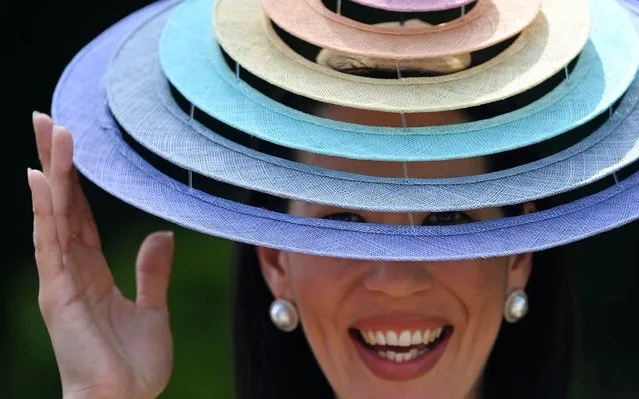 A visitor wears a fancy hat as she attends Ladies Day at Royal Ascot, in Ascot, Berkshire, Britain, 16 June 2022. Royal Ascot is Britain's most valuable horse race meeting and social event running daily from 14 to 18 June 2022. Britain's Queen Elizabeth is not expected to attend due to on-going mobility issues. (Photo by Andy Rain/EPA/EFE)