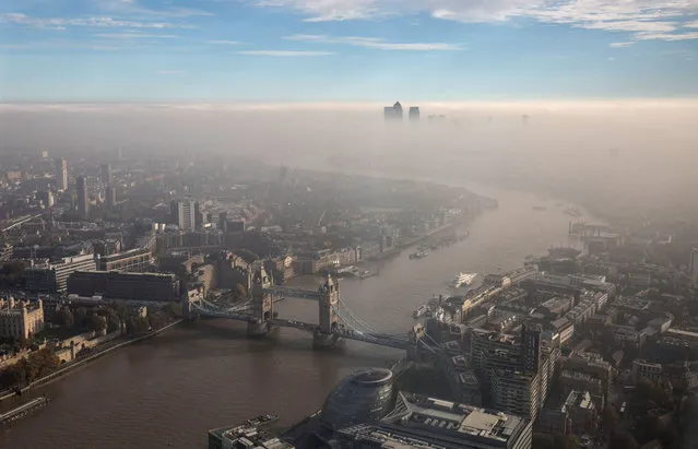 A general view of Tower Bridge and the city through the fog, seen from The View From The Shard on October 31, 2016 in London, England. (Photo by John Phillips/Getty Images)
