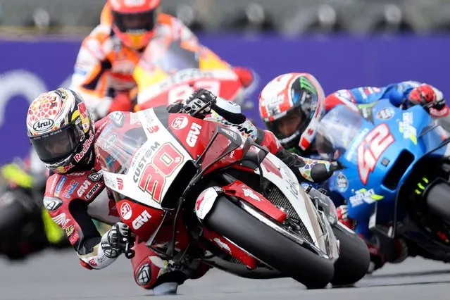 MotoGP rider Takaaki Nakagami of Japan takes a curve during the French Motorcycle Grand Prix in Le Mans, France, Sunday, May 16, 2021. (Photo by David Vincent/AP Photo)