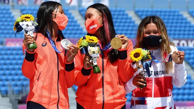 Silver Medalist Kokona Hiraki, Gold Medalist Sakura Yosozumi of Japan, Bronze Medalist Sky Brown of Great Britain during the medal ceremony of the Women's Park Skateboarding Final on day twelve of the Tokyo 2020 Olympic Games at Ariake Urban Sports Park on August 4, 2021 in Tokyo, Japan. (Photo by Mike Blake/Reuters)