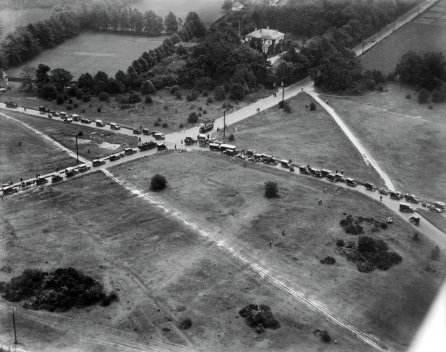 Traffic Jam, on the way to Epsom Derby 1923. In this photograph of a three-way traffic jam at Fir Tree Road in Banstead in Surrey, taken on the day of the 1923 Epsom Derby, it is easy to see why Alan Cobham saw aviation as the only solution to Britains road congestion business. In his autobiography A Time to Fly, Cobham recalled how Francis Wills came up with the idea of flying over Epsom to survey and photograph the worst of the Derby Day jams to help the police plan anti-congestion measures in the future