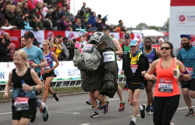Non elite runner in Save the Rhino fancy dress Runners during the London Marathon at United Kingdom on April 22, 2018 in London, England. 40,000 runners are taking part in the marathon alongside elite runners competing for a race. (Photo by Steven Paston/PA Wire Press Association)