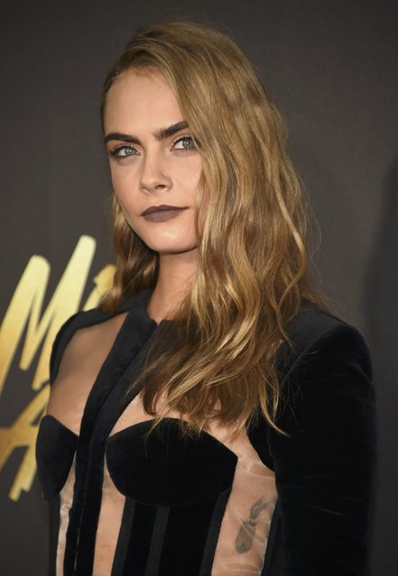 Model Cara Delevingne arrives at the 2016 MTV Movie Awards in Burbank, California April 9, 2016. (Photo by Phil McCarten/Reuters)
