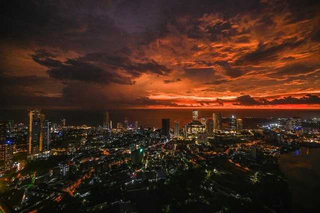 A general view shows the Sri Lankan capital Colombo as the sun sets on April 4, 2024. (Photo by Ishara S. Kodikara/AFP Photo)