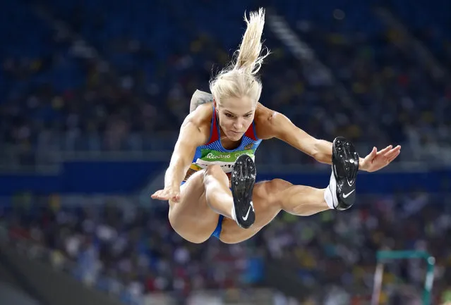 Dariya Klishina of Russia makes an attempt during the women's Long Jump Qualifying round of the Rio 2016 Olympic Games Athletics, Track and Field events at the Olympic Stadium in Rio de Janeiro, Brazil, 16 August 2016. (Photo by Diego Azubel/EPA)