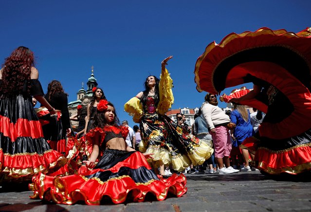 Participants of the Khamoro World Roma Festival dance in the historical centre of Prague, Czech Republic on June 3, 2023. (Photo by David W. Cerny/Reuters)