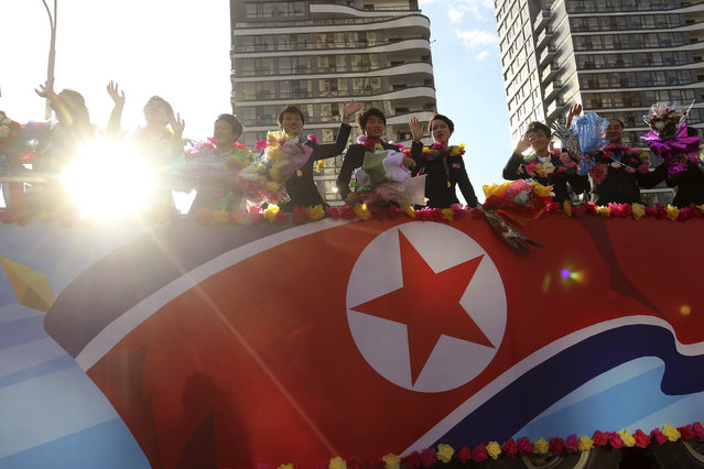 North Korea women's football team members wave to the crowd in Pyongyang, after they won the FIFA U-20 Women's World Cup held in Colombia, Saturday, September 28, 2024. (Photo by Jon Chol Jin/AP Photo)