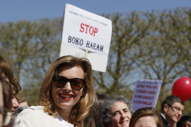 Former French first lady Valerie Trierweiler attends a gathering “Bring Back Our Girls” near the Eiffel Tower in Paris April 14, 2015 to mark one year since more than 200 schoolgirls were kidnapped in Chibok, north-eastern Nigeria, by Nigerian Islamist rebel group Boko Haram. (Photo by Gonzalo Fuentes/Reuters)