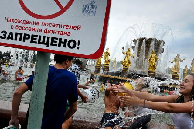 Flashmob: Water Battle on All-Russian Exhibition Center in Moscow, Russia, on August 5, 2012