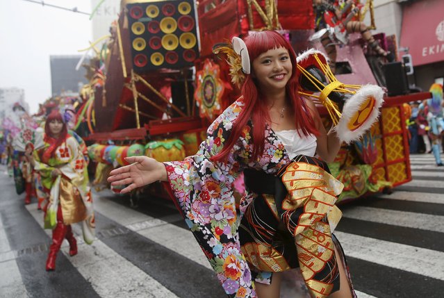 Japanese dancers perform during the 34th annual Asakusa Samba Carnival in Tokyo August 29, 2015. (Photo by Toru Hanai/Reuters)