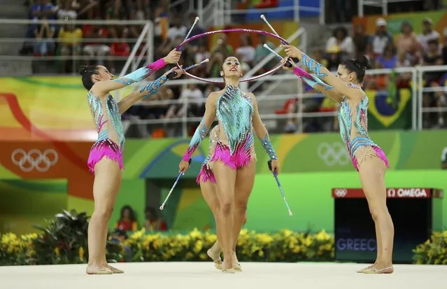 2016 Rio Olympics, Rhythmic Gymnastics, Preliminary, Group All-Around Qualification, Rotation 2, Rio Olympic Arena, Rio de Janeiro, Brazil on August 20, 2016. Team Greece (GRE) compete using clubs and hoops. (Photo by Mike Blake/Reuters)