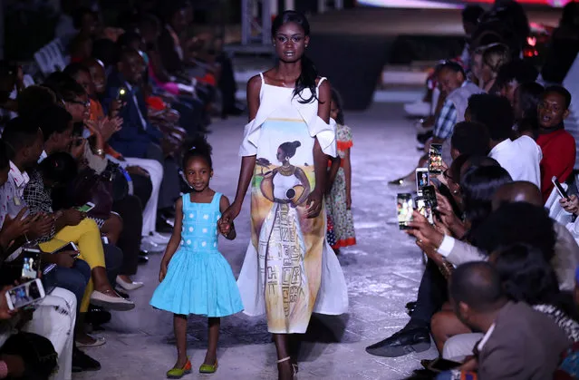 A model presents a creation from Magda Nicolas on the runway at the Haiti Fashion Week in Port-au-Prince, Haiti, January 30, 2018. (Photo by Andres Martinez Casares/Reuters)