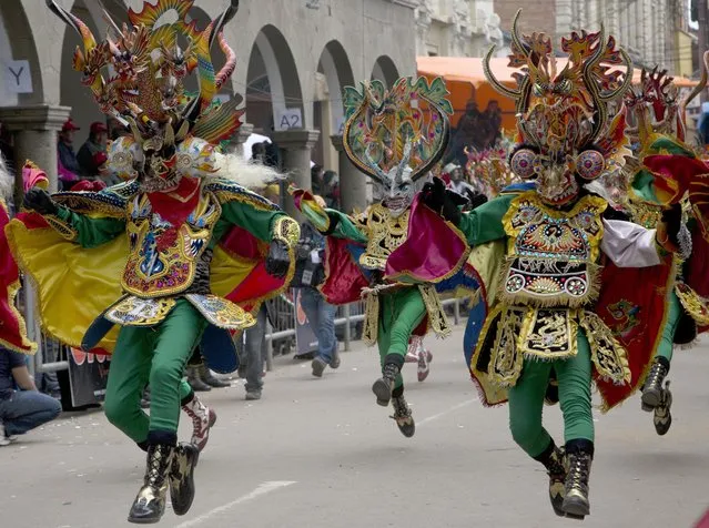 Dancers perform the traditional “Diablada” or Dance of the Devils during the Carnival in Oruro, Bolivia, Saturday, February 10, 2018. (Photo by Juan Karita/AP Photo)