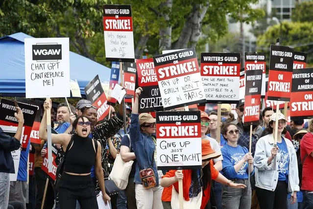 Members of the Writers Guild of America (WGA) demonstrate in front of Walt Disney Co. Studios in Burbank, California, USA, 03 May 2023. Writers Guild of America members went out on strike after the deadline for a new ratified contract passed on 01 May, as agreements between the Alliance of Motion Picture and Television Producers (AMPTP) and the WGA were not reached on better wages and working conditions for writers. (Photo by Caroline Brehman/EPA)