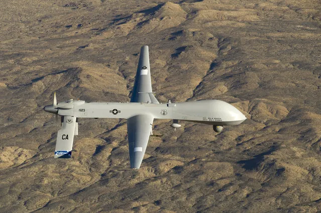 A U.S. Air Force MQ-1 Predator unmanned aerial vehicle assigned to the California Air National Guard's 163rd Reconnaissance Wing flies near the Southern California Logistics Airport in Victorville, California in this January 7, 2012 USAF handout photo obtained by Reuters February 6, 2013. (Photo by Tech. Sgt. Effrain Lopez/Reuters/U.S. Air Force)