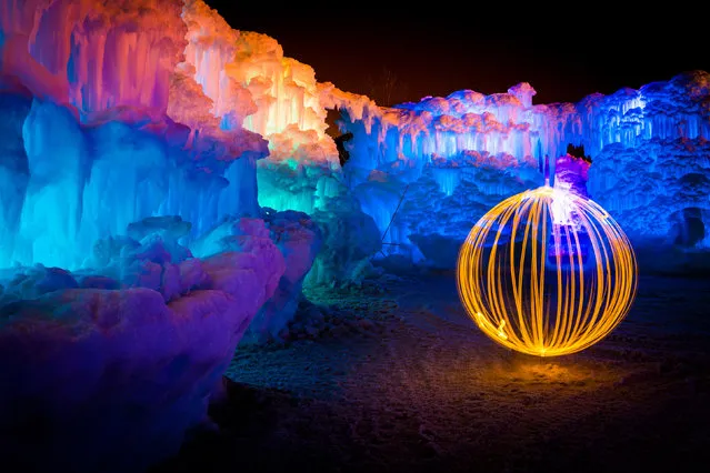 Fire ball in the ice castle. (Photo by Sam Scholes/Caters News)