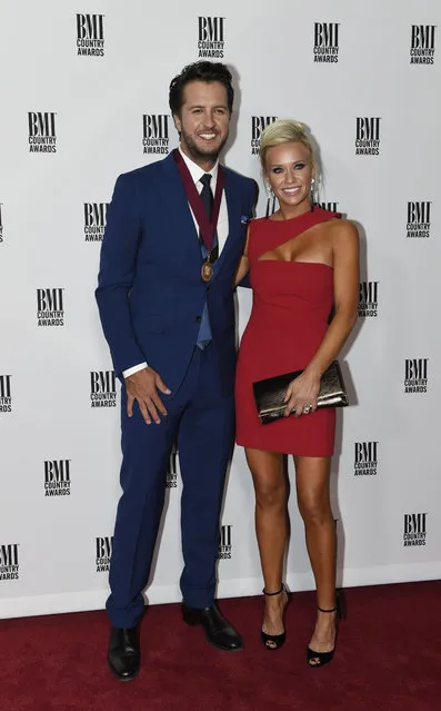 Luke Bryan and wife Caroline Boyer attend the 64th Annual BMI Country Awards at BMI on Tuesday, November 1, 2016, in Nashville, Tenn. (Photo by Sanford Myers/Invision/AP Photo)