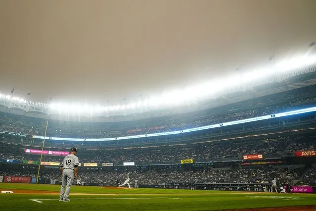 New York Yankees' Clarke Schmidt pitches to Chicago White Sox's Tim Anderson during the first inning of a baseball game Tuesday, June 6, 2023, in New York. Smoke from Canadian wildfires has traveled into the United States, resulting in a number of air quality alerts issued since May. (Photo by Frank Franklin II/AP Photo)