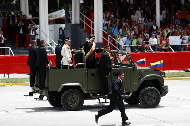 Venezuela's President Nicolas Maduro arrives to a military parade to celebrate the 207th anniversary of Venezuela's independence in Caracas, Venezuela July 5, 2018. (Photo by Marco Bello/Reuters)