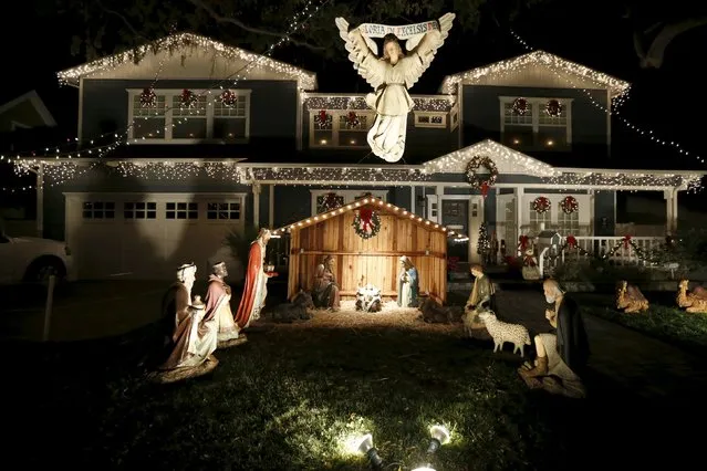 A Christmas nativity scene is seen outside a home in the Sleepy Hollow area of Torrance, California, United States, December 15, 2015. (Photo by Lucy Nicholson/Reuters)