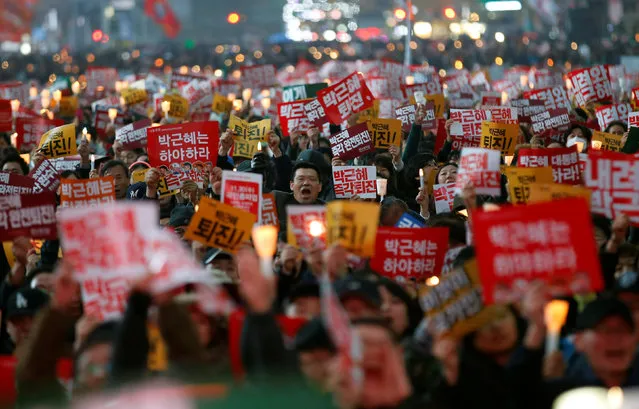 Protesters shout slogans at a protest calling South Korean President Park Geun-hye to step down, in Seoul, South Korea, November 19, 2016. (Photo by Kim Hong-Ji/Reuters)