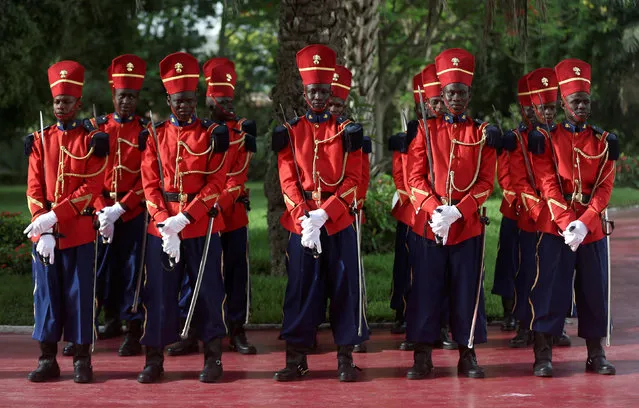 Senegalese guards stand outside the Presidential Palace prior to the arrival of Chinese President Xi Jinping during his visit to Dakar, Senegal July 21, 2018. (Photo by Mikal McAllister/Reuters)