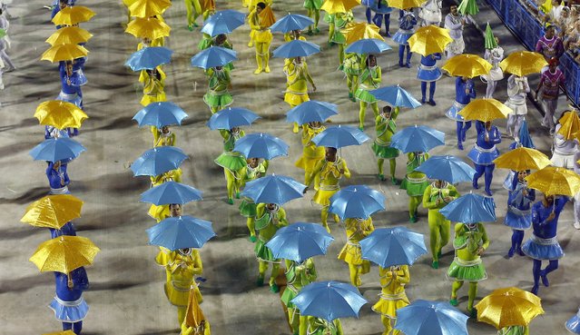 Revellers from the Viradouro samba school participate in the annual carnival parade in Rio de Janeiro's Sambadrome, February 15, 2015. (Photo by Ricardo Moraes/Reuters)
