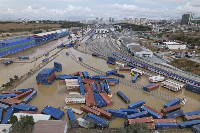 Containers are scattered next to a train station on the aftermath of floods caused by heavy rains in Istanbul, Turkey, Wednesday, September 6, 2023. Fierce rainstorms battered neighboring Greece, Turkey and Bulgaria on Tuesday, triggering flooding that caused at least seven deaths, including two holidaymakers swept away by a torrent that raged through a campsite in northwestern Turkey. (Photo by Ugur Yildirim/dia images via AP Photo)