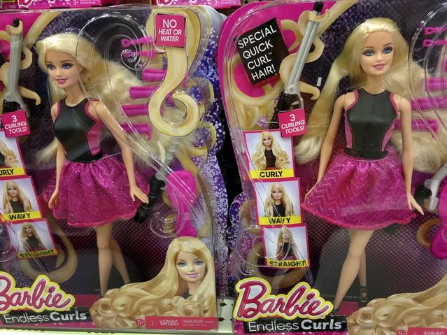 Barbie “Endless Curls” dolls are seen in the toy department of a retail store in Encinitas, California in this October 14, 2014, file photo.  Mattel Inc is expected to report Q4 earnings February 1, 2016. (Photo by Mike Blake/Reuters)