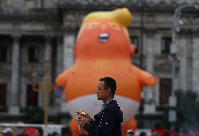 The Baby Trump balloon is seen ahead of the G20 leaders summit, in front of the Congress building in Buenos Aires, Argentina on November 30, 2018. (Photo by Pilar Olivares/Reuters)