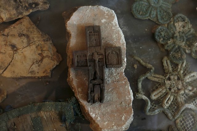 Artifacts are pictured inside St. George Church, also know as the Church of the Ten Lepers, in the West Bank town of Burqin near Jenin March 22, 2015. (Photo by Mohamad Torokman/Reuters)