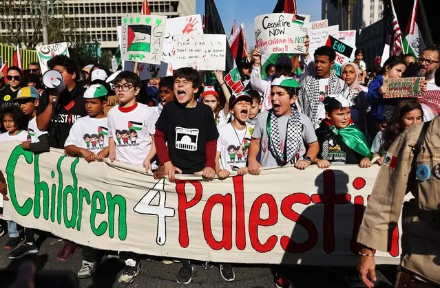 Young protestors chant during a ‘Children's March for Palestine’ on December 2, 2023 in Los Angeles, California. Israel and Hamas have resumed fighting with new Israeli strikes hitting southern Gaza following a truce that lasted nearly a week. Both sides had agreed on the release of Israeli hostages held in Gaza, as well as the release of Palestinian prisoners held in Israeli jails. Gazan health authorities say that over 15,000 have been killed by Israeli strikes since the October 7th Hamas attack in Israel. (Photo by Mario Tama/Getty Images)