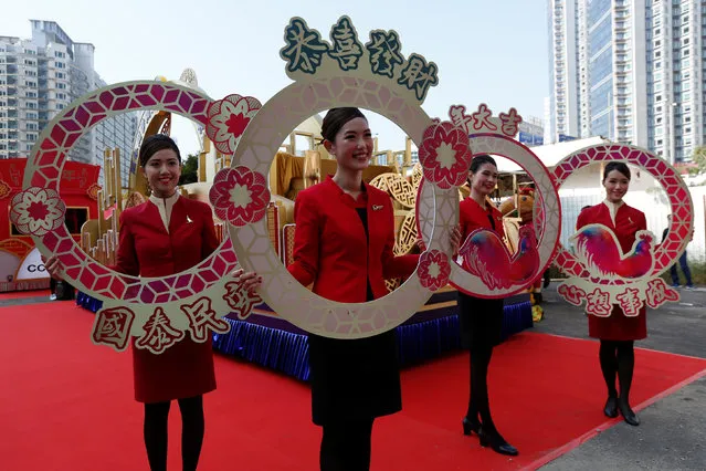 Flight attendants from Cathay Pacific Airways take part in the upcoming Chinese New Year parade during a rehearsal in Hong Kong, China January 25, 2017. (Photo by Bobby Yip/Reuters)