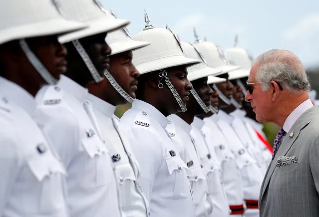 Britain's Prince Charles attends an official welcome ceremony at Parliament after arriving in Grenada, March 23, 2019. (Photo by Phil Noble/Reuters)