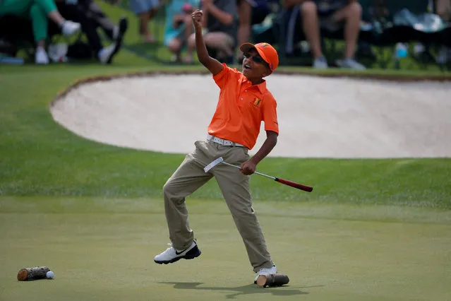 Aadi Parmar of Selma, Texas, reacts after sinking a long putt during the Drive Chip and Putt National Finals at the Augusta National Golf Club in Augusta, Georgia, U.S., April 7, 2019. (Photo by Brian Snyder/Reuters)