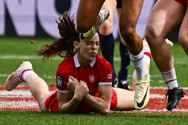 Canada’s Piper Logan is hit in the face while tackling France’s Anne-Cécile Ciofani during the France vs Canada match in the 2024 HSBC Rugby Sevens LA women’s tournament at Dignity Health Sports Park in Carson, California on March 3, 2024. (Photo by Patrick T. Fallon/AFP Photo)