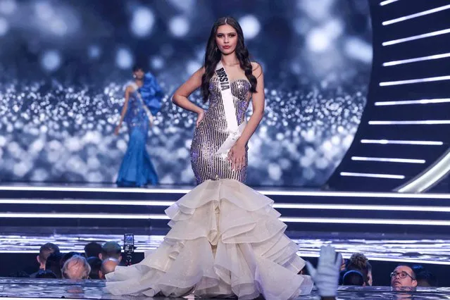 Miss Russia, Ralina Arabova, presents herself on stage during the preliminary stage of the 70th Miss Universe beauty pageant in Israel's southern Red Sea coastal city of Eilat on December 10, 2021. (Photo by Menahem Kahana/AFP Photo)