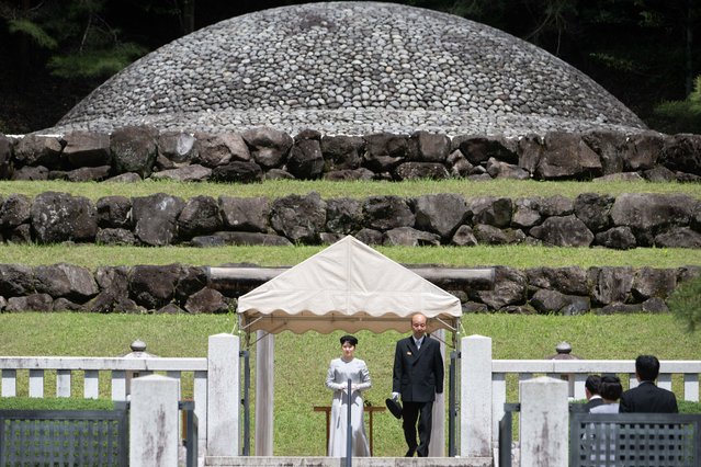 Japan's Princess Aiko (C) visits the tomb of late Empress Nagako who died in 2000, at the Musashi Imperial Graveyard in Hachioji, west of Tokyo on April 25, 2024. (Photo by Yuichi Yamazaki/Pool via AFP Photo)