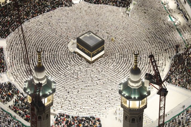 An aerial view shows Muslims coming from all over the world to the holy land continue their prayers to fulfill the Hajj pilgrimage as they circumambulate and pray at the Kaaba in Mecca, Saudi Arabia on June 11, 2024. (Photo by Issam Rimawi/Anadolu via Getty Images)