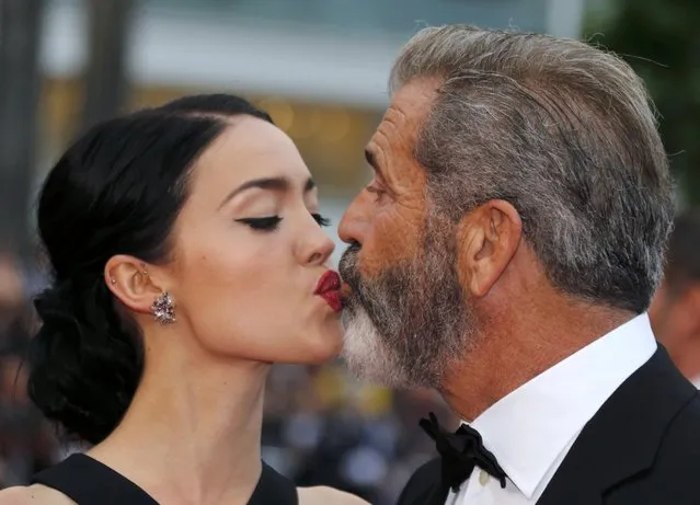 Actor Mel Gibson and partner Rosalind Ross pose on the red carpet as they arrive at the closing ceremony of the 69th Cannes Film Festival in Cannes, France, May 22, 2016. (Photo by Regis Duvignau/Reuters)