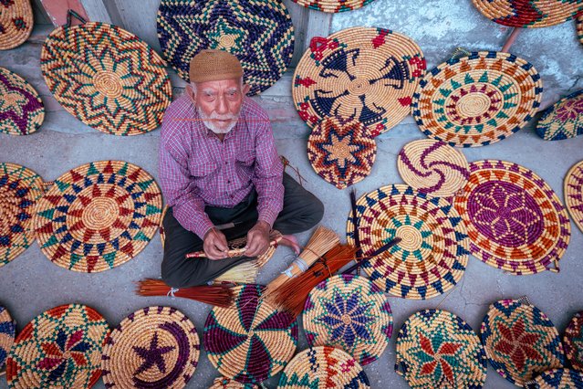 90 years old Niyazi Koleoglu weaves wicker from wheat stalks for 65 years in Altinkaya village in Hatay's Altinozu district, Turkiye on August 16, 2024. (Photo by Meric Aktar/Anadolu via Getty Images)