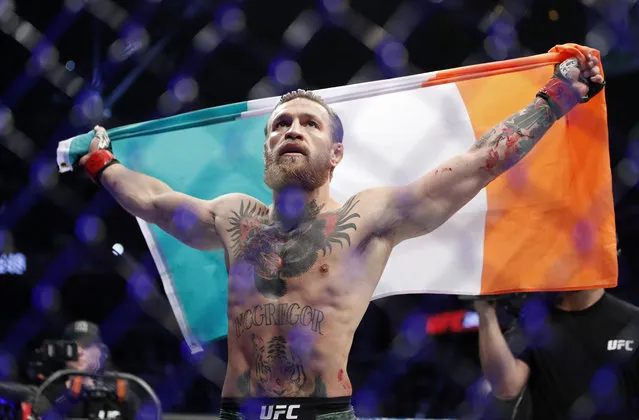 Conor McGregor celebrates after defeating Donald “Cowboy” Cerrone during a UFC 246 welterweight mixed martial arts bout Saturday, January 18, 2020, in Las Vegas. (Photo by John Locher/AP Photo)