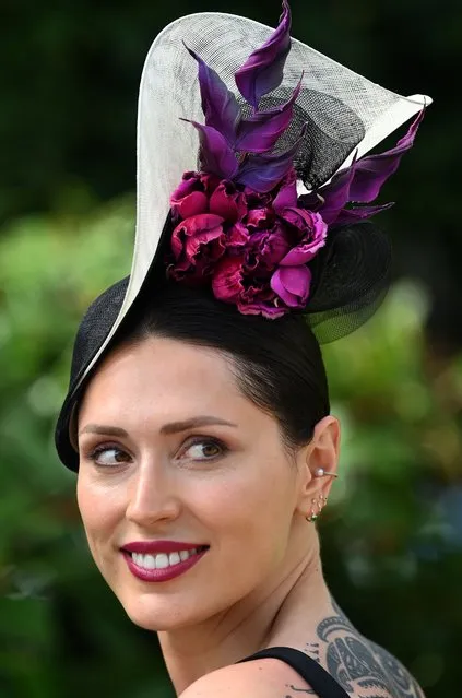 A visitor wears a fancy hat as she attends Ladies Day at Royal Ascot, in Ascot, Berkshire, Britain, 16 June 2022. Royal Ascot is Britain's most valuable horse race meeting and social event running daily from 14 to 18 June 2022. Britain's Queen Elizabeth is not expected to attend due to on-going mobility issues. (Photo by Andy Rain/EPA/EFE)