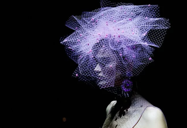 A model presents a creation by designer Giorgio Armani as part of his Haute Couture Fall/Winter 2022-2023 collection show for fashion house Giorgio Armani Prive in Paris, France on July 5, 2022. (Photo by Johanna Geron/Reuters)