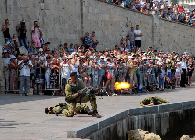 Russian marines perform during the Navy Day celebrations in Sevastopol, Crimea, July 31, 2016. (Photo by Pavel Rebrov/Reuters)