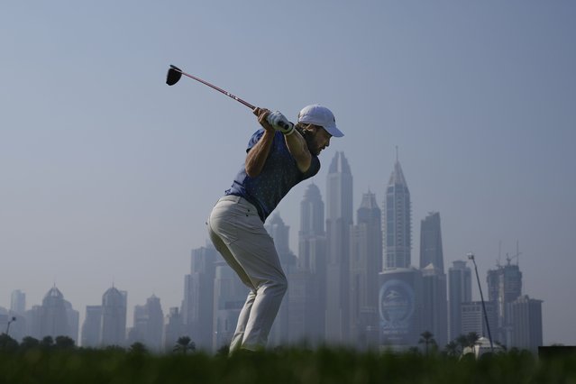 Tommy Fleetwood of England tees off at the 8th hole during the second round of the Dubai Desert Classic golf tournament, in Dubai, United Arab Emirates, Friday, January 17, 2025. (Photo by Altaf Qadri/AP Photo)