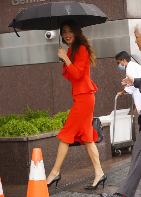Lebanese-British barrister Amal Clooney spotted stepping out in New York City on September 22, 2022. Amal looked stylish wearing a red dress and carrying an umbrella in the rain. (Photo by The Image Direct)