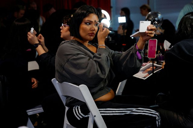 Models prepare backstage before the show of designer Christian Siriano during New York Fashion Week Fall-Winter 2025 in New York City, U.S., February 6, 2025. (Photo by Shannon Stapleton/Reuters)